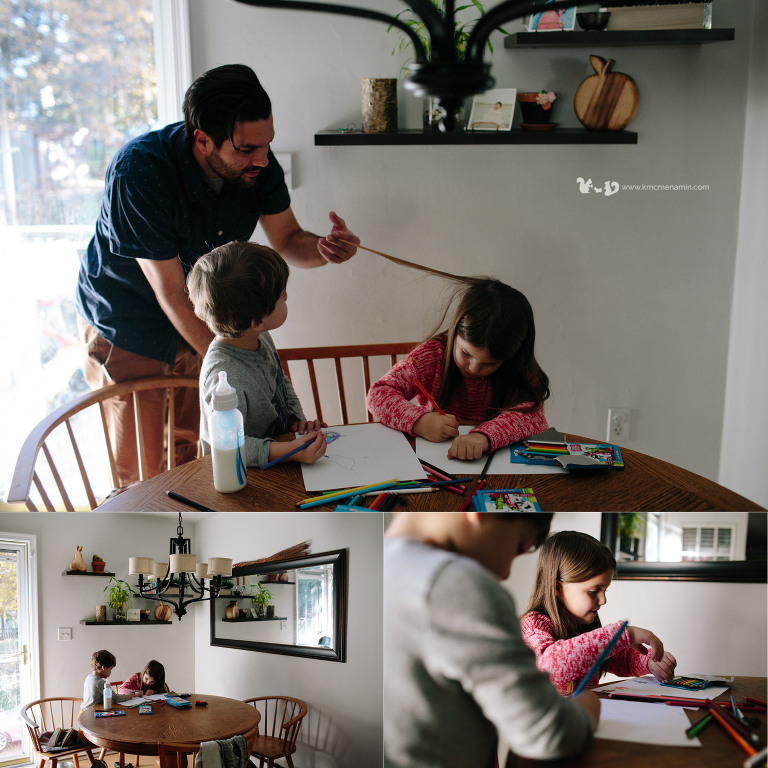 little girl drawing with dad