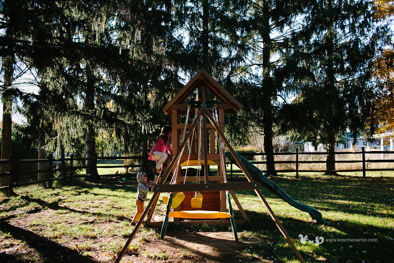 little kids climbing swing set
