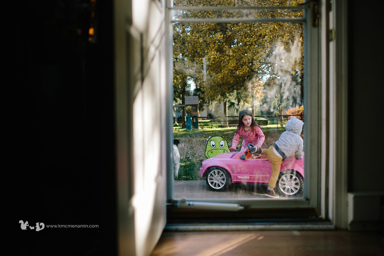 kids getting in play car out window