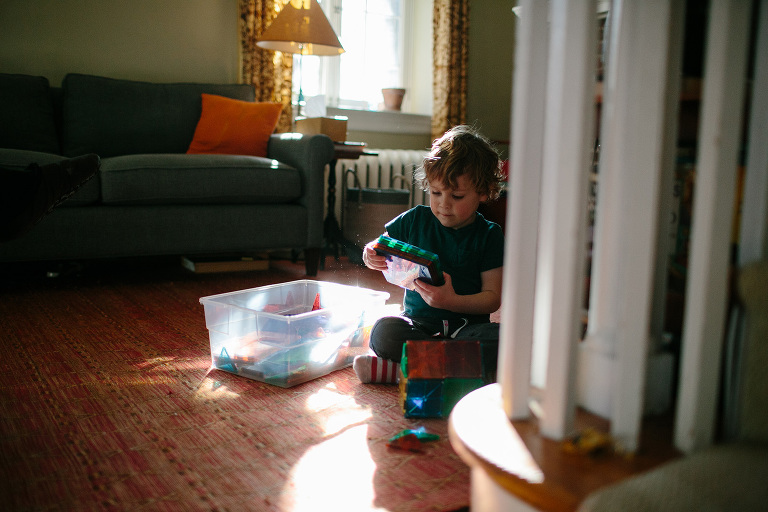 boy building with magnatiles photojournalistic family session