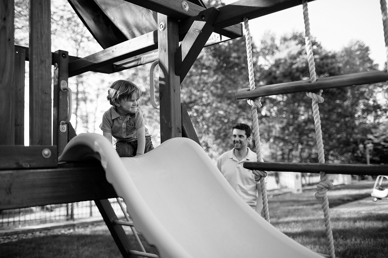toddler about to go down slide