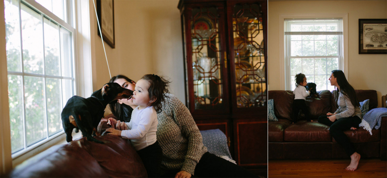 image of little girl and mom sitting in the window with dog