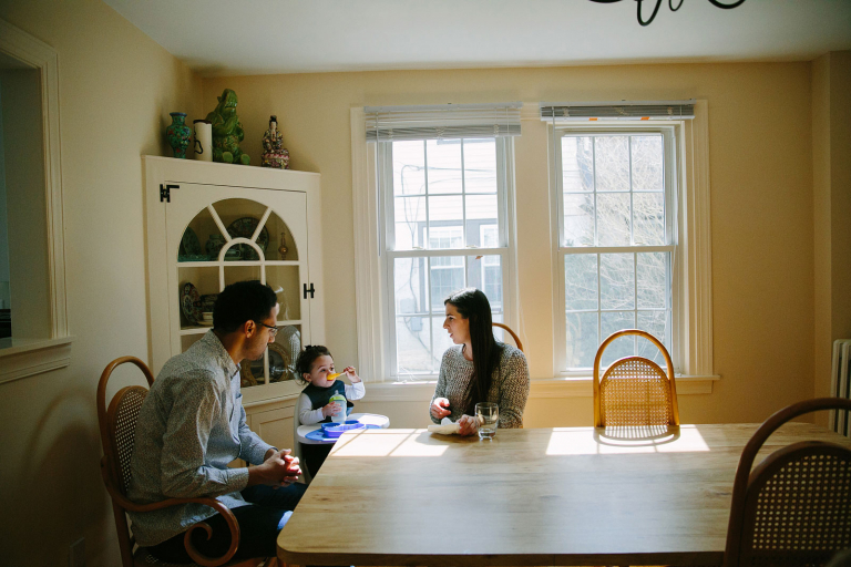 Wynnewood Documentary Family Photograph of family sitting at dining room table eating