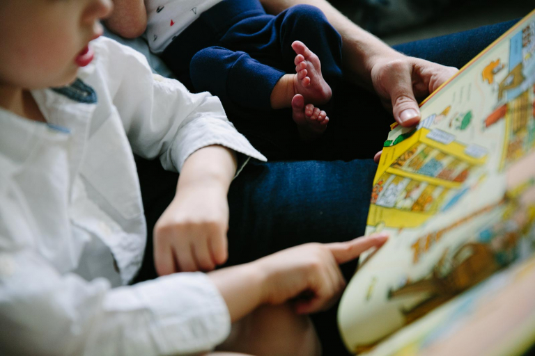 Documentary photograph of closeup of baby feet