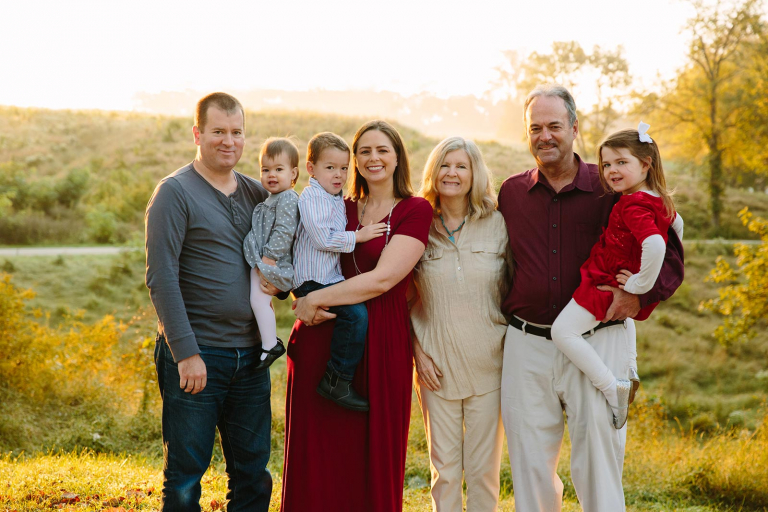 Photograph of family with grandparents at sunrise in valley forge park
