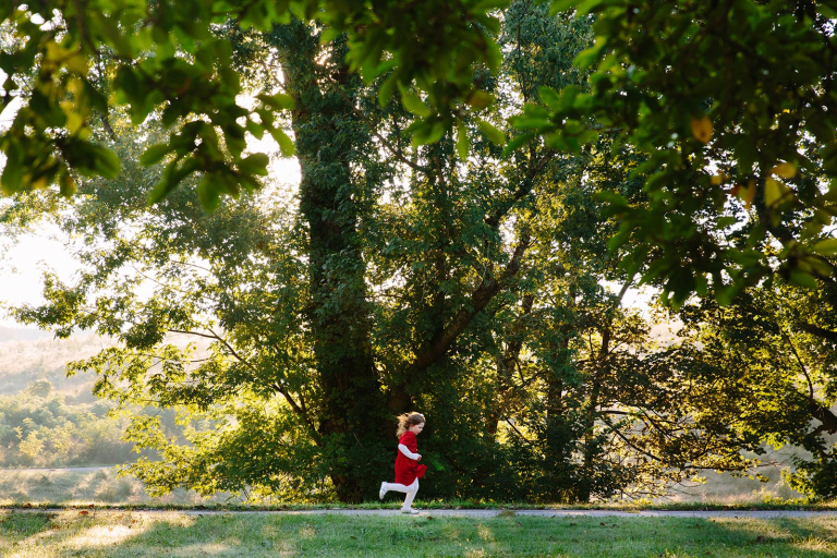 Little girl running at valley forge park