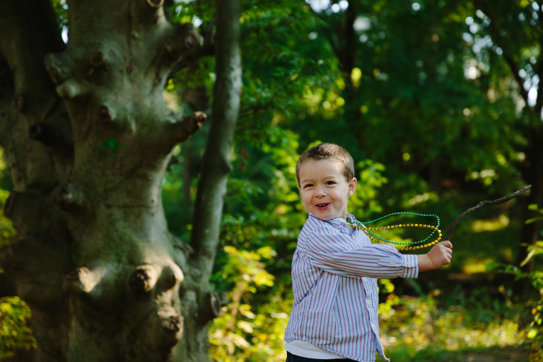 Photograph of boy playing with stick at valley forge park
