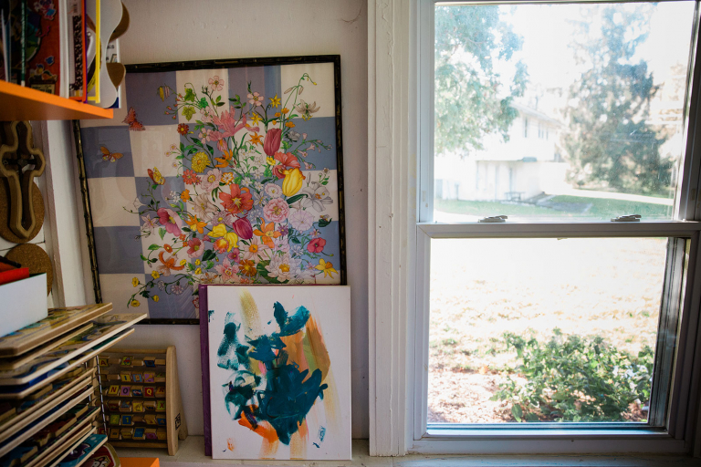 Image of kids' paintings and window