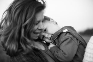 family photography mom and son snuggling